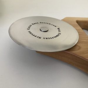 tool for stretched fabric wall